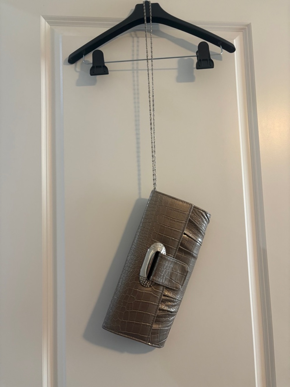 Dark champagne clutch for special events.  Chain strap